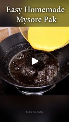 a frying pan filled with food on top of a stove