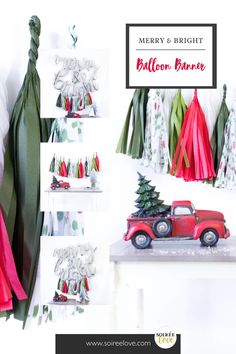 a red truck is parked in front of some christmas trees and other items that are hanging on the wall