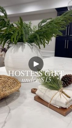 a kitchen counter with pine cones, napkins and other items on top of it