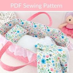 a sewing pattern for a baby's crib with flowers on it and a stuffed animal