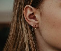 "These CZ stud with hoop are the perfect double piercing earring. Up your ear stack game with this gold hoop with a CZ stud that's connected with a chain. These huggies and studs are super easy to put on and are secure with leverbacks that you can trust. Double earrings are so on trend and you can wear 2 sets on each ear, or go a bit edgier with just one ear set. THE DETAILS: 🖤 12mm 14k Gold Filled or Sterling Silver Hoop 🖤 14k Gold Filled or Sterling Silver 1 Inch Chain 🖤 4mm Gold Sterling S Double Piercing Earring, Double Earring, Double Stud Earrings, Stack Game, Silver Wrapping Paper, Bridesmaid Gifts Earrings, Silver Butterfly Earrings, Double Earrings, Double Piercing