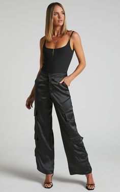 Saori Pants - Mid Rise Cargo Pants in Black | Showpo USA Black Cargo Pants Outfit Women, Low Rise Pants Outfit, Cargo Outfits Women, Cargo Trousers Outfit, Satin Pants Outfit, Black Cargo Pants Outfit, Satin Cargo Pants, Satin Outfit, Drawstring Pants Outfit