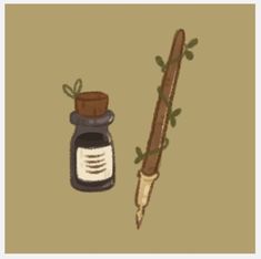 a pen and ink bottle sitting next to each other on a brown background with green leaves