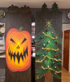 two wooden boards decorated with pumpkins, trees and other holiday decorations on the wall