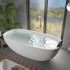 a large bath tub sitting in a bathroom next to a window with glass panes