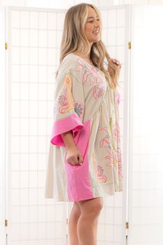 Get ready to flaunt your cute and trendy boho style with the Boho Embroidered Pink Babydoll Dress! The beautifully embroidered taupe fabric and colorblock trim in pink exude feminine and playful charm, while the oversized babydoll silhouette provides comfort and effortless style. The wide quarter length sleeves complete the look and make this dress perfect for beating the heat. Plus, the convenient side pockets add a practical touch to this gorgeous dress. Embrace your boho vibe with this must-h Beige Embroidered Hem Summer Dress, Embroidered Summer Loungewear Dresses, Beige Embroidered Hem Dress For Summer, Beige Embroidered Dress With Hem Detail For Summer, Cute Multicolor Embroidery Spring Dresses, Cute Multicolor Embroidered Spring Dress, Casual Beige Cotton Embroidered Dress, Pink Cotton Dress For Loungewear, Pink Cotton Embroidered Dress For Spring