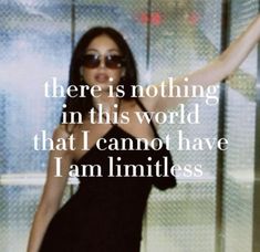 a woman in a black dress is holding her arms out with the words there is nothing in this world that i cannot have i am limitless