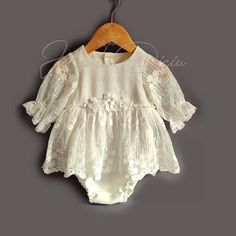 "This is gorgeous  lace baptism bodysuit for baby girl. Bodysuit is made from pretty floral  lace and tulle is perfect for your baby's baptism/ christening/ blessing day!  The set options are: -Baptism romper/ bodysuit -Flower and pearl beads shoes -Headband -Bonnet All garments are made from high quality and soft fabrics. Long skirt is perfect for the ceremony part in the church and can be removed afterwards. Baby stays in cute butterfly romper for her ultimate comfort. Sizes available: ( these are outfit measurements) 0-3 months, ( Chest 16\",) 3-6 months, (Chest 17.5\") 6-9 months (Chest 18.5) 9-12 months (Chest 19.5\") 12-18 months, (Chest 20\") 18-24 months. (Chest 21\")" Elegant Fitted Baptism Dress For Spring, Elegant Fitted Baptism Dress With Lace Patchwork, Elegant Lace Patchwork Dress For Baptism, Spring First Communion Fitted Lace Dress, Spring Lace Baptism Dress With Patchwork, Elegant Lace Bodice Baptism Dress For Spring, Fitted Lace Dress For First Communion In Spring, Spring Fitted Lace Dress For First Communion, Fitted Lace Dress For First Communion Summer