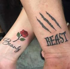 two people with matching tattoos on their arms that say beauty and beast next to each other