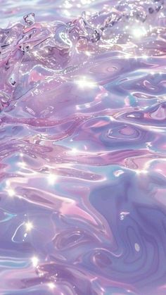 the water is blue and purple with bubbles