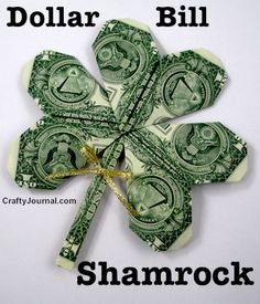 four leaf clover made out of dollar bills