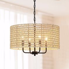 Nothing adds warmth and a casual inviting vibe like a natural woven chandelier. This pendant chandelier light is meticulously hand woven of natural rattan and bamboo in an 2-tier drum silhouette. Inside, a 4-light cluster in matte black casts generous light and creates interesting shadow patterns on the walls of your dining room, living room or bedroom. This collection can work with a variety of boho decors and even work in homes with coastal or farmhouse styling, which is an ideal selection for Woven Chandelier, Drum Silhouette, Black Coastal, Farmhouse Styling, Cage Chandelier, Drum Chandelier, Chandelier Light, Pendant Chandelier, Chandelier Lighting