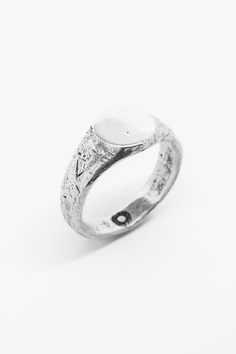 Introducing The Circa Ring by Merchants of the Sun, a unique and minimalist signet ring featuring a blank circle design. Meticulously handcrafted from 925 sterling silver, this ring stands out with its hammered edge detail, adding a touch of individuality. Elevate your style with The Circa Ring, a distinctive accessory that reflects exceptional craftsmanship and a commitment to simplicity, making a bold statement about refined taste and a connection to timeless design. Left to its own devices, t Silver Signet Ring, Ring Stand, Mens Silver Rings, Never Underestimate, Minimalist Ring, Hammered Silver, Minimalist Rings, Circle Design, Round Face