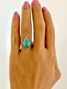 "A Vintage Style bohemian genuine turquoise ring set in sterling silver plated with rhodium. Ring in approx. .75\" tall x .5\" wide. Stone size is 13 x 9 mm. Band width is approx. 2.2mm" Handmade Turquoise Opal Bohemian Ring, Bohemian Teardrop Gemstone Ring, Bohemian Sterling Silver Turquoise Ring Nickel Free, Bohemian Sterling Silver Turquoise Wedding Ring, Bohemian Sterling Silver Turquoise Ring With Eco-friendly Gemstones, Nickel-free Bohemian Turquoise Ring, Bohemian Turquoise Opal Ring With Natural Stones, Bohemian Teardrop Turquoise Adjustable Ring, Bohemian Adjustable Teardrop Turquoise Ring