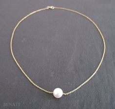 "New from Benati! A extremely elegant freshwater round pearl necklace, floating gracefully on a beautiful solid 14k gold link chain. Crafted to perfection in 14k solid gold. The pearl is hanged on a elegant, delicate and durable, gold links chain (As seen in pictures), approx. width: 1.0 mm (0.039\") chain. You or your friend will look super fine with this new exclusive design - by Benati. The size of the round pearl is approx.: 8 mm round - 0.31\" a very beautiful and high quality freshwater pe Formal White Pearl Necklace With Cable Chain, Elegant Cable Chain Necklace For Wedding, Elegant Wedding Cable Chain Necklace, Elegant White Pearl Necklace With Cable Chain, Formal Pearl Necklace With Gold Chain, Formal Yellow Gold Chain Necklace With Pearl Charm, Delicate Gold Pearl Necklace With Cable Chain, Gold Pearl Necklace With Cable Chain, Elegant Pearl Necklace With Cable Chain