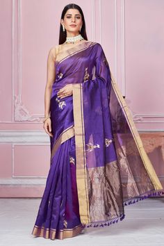 Buy purple Banarasi sari online in USA with golden zari border and zari motifs. Look your best on festive occasions in latest designer sarees, pure silk saris, Kanchipuram silk sarees, handwoven sarees, tussar silk saris, embroidered sarees from Pure Elegance Indian fashion store in USA.-full view Festive Purple Tussar Silk Pre-draped Saree, Purple Pre-draped Saree With Zari Work For Celebration, Purple Handloom Pre-draped Saree For Puja, Purple Handloom Chanderi Pre-draped Saree, Bollywood Style Purple Handloom Pre-draped Saree, Purple Handloom Pre-draped Saree For Diwali, Elegant Cotton Silk Saree In Purple, Traditional Purple Tissue Silk Pre-draped Saree, Purple Unstitched Cotton Silk Saree