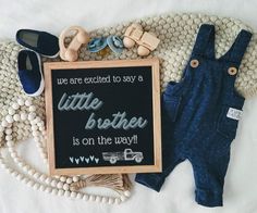 a sign that says, we are excited to say a little brother is on the way