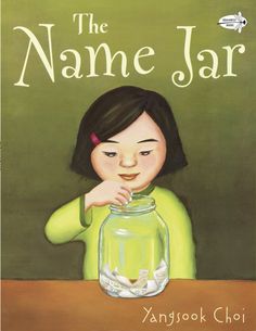 the name jar book cover with an illustration of a girl in a green shirt holding a jar