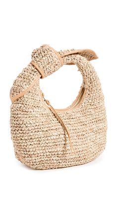 PRICES MAY VARY. Fabric: Woven straw Knotted handle, Leather trim Length: 9.5in / 24cm, Height: 4.75in / 12cm, Handle drop: 3.25in / 8cm, Depth: 3.5in / 9cm Zip at top Textile lining The Josie Knot Bag Best Beach Bag, Knot Bag, Slouch Bags, Woven Raffia, Straw Bags, Straw Tote, Market Tote, Kids Luggage, Beach Bag