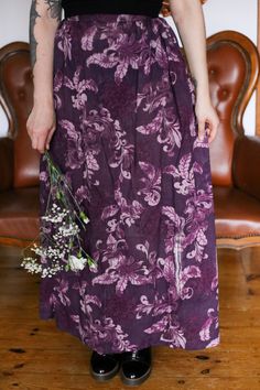 This beautiful purple colored maxi skirt is a unique vintage piece. I'ts a hand-sewn skirt that was used in a theatre. The floral patterned skirt is guaranteed to be your new favorite piece for summer and fall. It is wide and airy and very long. Combine it with some boots for a chunky look or with sandals, a short top and some eye-catching accessories and you have a special outfit for any occasion.  THE DETAILS: -beautiful floral vintage skirt -no size as it is custom made, please check the meas Purple Flowy Long Dress, Vintage Purple Lined Skirt, Purple Long Flowy Dress, Purple Maxi Skirt For Summer, Purple Bohemian Maxi Skirt, Purple Flowy Maxi Skirt, Purple Relaxed Lined Maxi Skirt, Relaxed Purple Maxi Skirt With Lining, Purple Relaxed Maxi Skirt With Lining