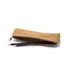 Designed as a pencil case, the slim converts easily to a coin purse, reading glass protective case, or makeup brush bag. Makeup Brush Bag, Washable Paper, Handbag Organization, A Pencil, Pencil Pouch, Makeup Brush, You Bag, Pencil Case, Makeup Brushes