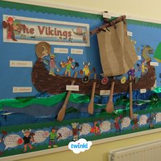 a bulletin board with an image of a viking ship on it's back wall