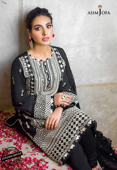 FABRIC: LAWNCOLOR: BLACK PRODUCT DETAILS Eloquently beautiful Iqra Aziz slays in this black attire. A noir lawn base is decked with stunning off white threadwork uplifted by heavy 9mm sequins giving it a tribal feel. It’s complemented by a diaphanous heavily embroidered chiffon dupatta and plain dyed cotton trouser.DESIGN DETAILS:1.25 meters Embroidered Front on lawn1.25 meters Plain dyed lawn for back0.75 meters Embroidered Sleeves with border on lawn2.5 meters Embroidered Dupatta on chiffon (i Black Sharara For Eid, Unstitched Black Sharara With Resham Embroidery, Black Resham Embroidery Unstitched Sharara, Elegant Black Georgette Set, Semi-stitched Black Dress With Dabka, Black Semi-stitched Dress With Dabka Detailing, Black Unstitched Sharara For Eid, Elegant Black Kurta With Naqshi, Unstitched Black Sharara For Eid