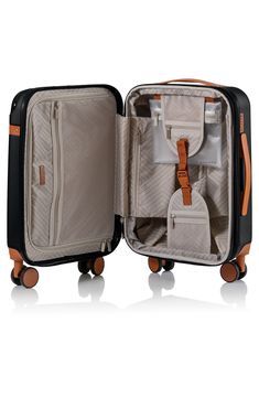 This retro-inspired carry-on suitcase is the ideal travel companion thanks to an expandable packing space, secure water-resistant shell, USB charging port and 360-degree spinner wheels. 21" x 13.5" x 9 Telescopic top handle, top and side flat handles Zip around closure TSA approved locking mechanism Polycarbonate Lined Imported Hardside Luggage Sets, Luggage Locks, Diamond Logo, Tsa Approved, Carry On Suitcase, Locking Mechanism, Red Diamond, Luggage Sets, Carry On Luggage