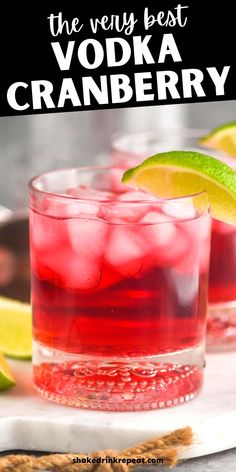 the very best vodka cranberry cocktail in a glass with lime wedges and crackers