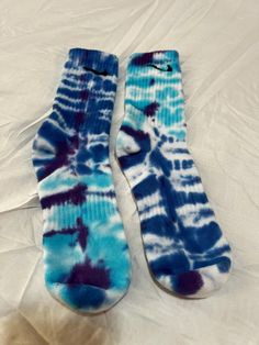 Hand dyed Nike socks. Done in turquoise and royal blue. Socks were bought new and dyed. Each one of my pieces is pre-soaked in soda ash before being hand tied, then dyed using procion dyes for bold long lasting colors. Pre-washed and fully color-set, every item is one of a kind, offering a truly unique and vibrant style. Custom orders are available feel free to message me for details and questions! Nike Socks, Casual Socks, Socks And Hosiery, Color Set, Hosiery, Royal Blue, Hand Dyeing, Dye, Socks