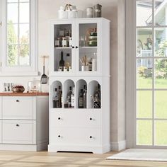 a tall white cabinet filled with lots of bottles