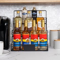 an organized spice rack in the kitchen with various spices and condiments on it