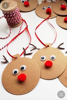 these reindeer ornaments are made out of brown paper and twine with red nose noses