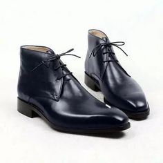 Introducing our Handmade Men Navy Blue Color Ankle High Boots, the perfect blend of style, craftsmanship, and comfort. These Navy Blue Chukka Boots are designed exclusively for men who appreciate the finer things in life. Made from the finest quality leather, these boots are a testament to our commitment to providing you with top-notch footwear. Crafted with utmost care and attention to detail, these boots feature an upper calf leather construction that not only exudes sophistication but also ensures durability. The soft leather lining adds a touch of luxury, providing a comfortable and cozy fit for your feet. The leather sole offers excellent traction and stability, making these boots perfect for both formal and casual occasions. Designed specifically for men, these boots are tailored to Ankle High Boots, Handmade Boot, High Ankle Boots, Cozy Fits, Mens Shoes Boots, Navy Blue Color, Chukka Boots, High Boots, Boots Men