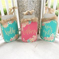 three mason jars are decorated with flowers and the words hello