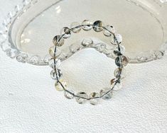 HERKIMER Diamond Bracelet, Crystal Bracelet - Etsy Hand-strung Silver Crystal Bangle Bracelet, Silver Crystal Bracelet With 8mm Beads, Silver Round Crystal Bracelet With 8mm Beads, Gift Crystal Bracelet With Spacer Beads, Healing Crystal Bracelet With Spacer Beads, Silver Crystal Bracelet With Polished Beads, Stone Bracelets, Bracelet Crystal, Herkimer Diamond