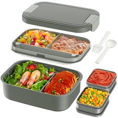 three trays with different types of food in them and one container filled with salad