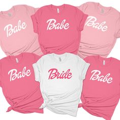 four pink and white shirts with the word bake on them, all in different colors