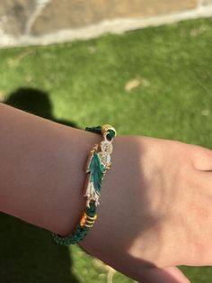 a person wearing a bracelet on their arm