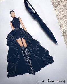 a drawing of a woman in a black dress and high heels with a pen next to it