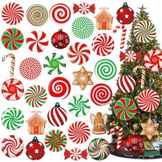 a christmas tree surrounded by assorted candy canes and candies on white background