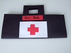 a bag with a red cross on it and the words dr bob written on it