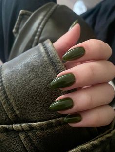 Embrace the rich, earthy tones of fall with this chic olive green nail inspiration. Perfect for those looking to make a bold statement, these nail designs blend elegance with a touch of daring. Whether you prefer matte finishes or glossy sheens, olive green offers a versatile palette that complements any autumn outfit. Get ready to turn heads and express your unique style with these stunning nail ideas that capture the essence of the season. Green N Black Nails, Almond Nails Olive Green, Green Nails Inspo Aesthetic, Green Nails Outfit, Nails 2024 Green, Plain Green Nails, Green Nails 2024, Dark Green Nails Almond, Almond Nails Dark Green