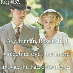 a man in a suit and tie standing next to a woman wearing a hat with the caption as a human, roselie had violet eyes, but in the movie, she had brown eyes