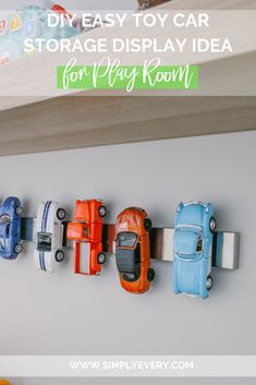 toy cars are lined up in a row on the wall with text overlay that says diy easy toy car storage display idea for play room