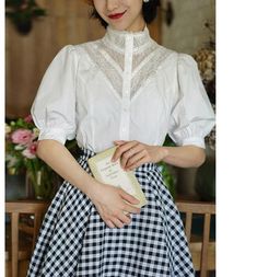 White lace blouse with eye-catching embroidery on the chest.
 It gives the impression of a neat and elegant young lady.
 The balance between the puff sleeves and the cinched waist is beautiful, creating a classic style.



 <Size>





 small size



 Length: 56cm

 Shoulder width: 35cm

 Bust: 88cm

 Sleeve length: 32cm




 medium size



 Length: 57cm

 Shoulder width: 36cm

 Bust: 92cm

 Sleeve length: 33cm




 L size



 Length: 58cm

 Shoulder width: 37cm

 Bust: 96cm

 Sleeve length: 33.5cm











 <Material>



 cotton






 <model wearing>



 wearing size



 medium size




 model dimensions



 Height: 170cm

 Weight: 55kg

 Bust: 84cm

 Waist: 65cm

 Hip: 94cm Formal Lace Patchwork Blouse, Elegant Puff Sleeve Lace Top, Elegant Lace Top With Puff Sleeves, Elegant Fitted Lace Top With Puff Sleeves, Elegant Blouse With Lace Top And Lantern Sleeves, Elegant White Lace Top With Puff Sleeves, Feminine Formal Blouse With Lace Patchwork, Feminine Lace Patchwork Blouse For Formal Occasions, Elegant Lantern Sleeve Blouse With Lace Trim