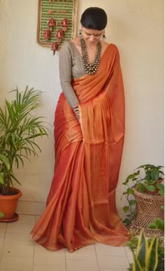 How to Look Stylish in Sarees Handloom Tissue Silk Saree In Orange, Handloom Orange Tissue Silk Saree, Festive Orange Cotton Silk Blouse Piece, Orange Tussar Silk Blouse Piece For Wedding, Orange Cotton Silk Blouse Piece For Festivals, Orange Cotton Silk Blouse Piece With Pallu, Orange Chanderi Handloom Blouse Piece, Orange Handloom Cotton Silk Blouse Piece, Handloom Cotton Silk Orange Blouse Piece