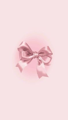 a pink background with a large bow on it