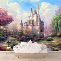 a bedroom scene with a rainbow in the sky and a castle mural on the wall