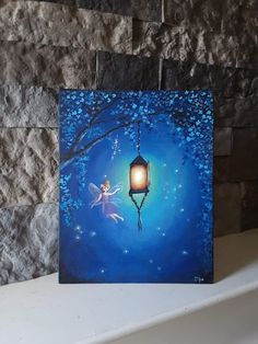 a painting of a fairy holding a lantern in front of a blue background with flowers